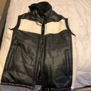 It’s a black and cream white vest leather with a hoodie and washed and dry to!